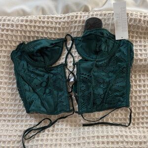 Urban Outfitters teal front lace up corset